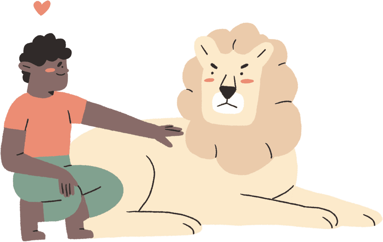 A person kneeling to gently rest a hand on a calm lion